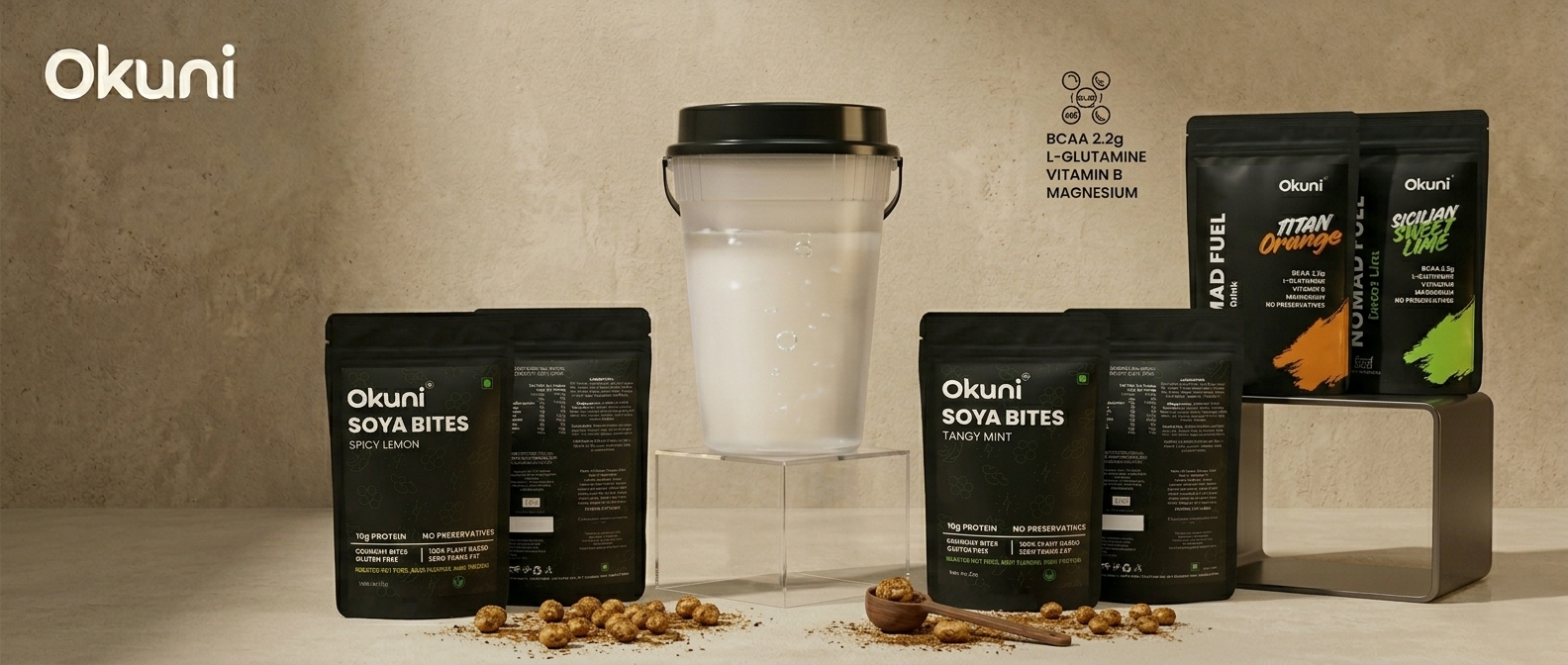 Okuni protein powder packages and Soya Bites on a neutral background